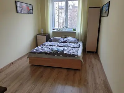 Łóżko lub łóżka w pokoju w obiekcie Fantastic-Inn Warszawa - NS54