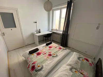 Łóżko lub łóżka w pokoju w obiekcie Fantastic-Inn Warszawa - NS54