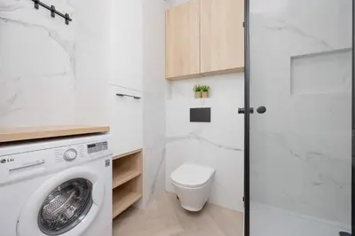 Łazienka w obiekcie Grzybowska Stylish Apartment with Air Conditioning in Warsaw Wola by Noclegi Renters
