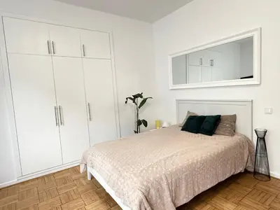 Łóżko lub łóżka w pokoju w obiekcie Coast Studio