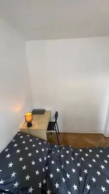Łóżko lub łóżka w pokoju w obiekcie Rooms in Warsaw - K3 - 2