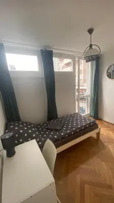 Łóżko lub łóżka w pokoju w obiekcie Rooms in Warsaw - K3 - 2