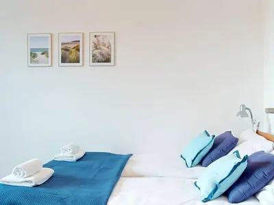 Łóżko lub łóżka w pokoju w obiekcie Flora Apartment Ursynow 2 Bedrooms & Parking