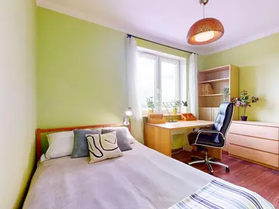 Łóżko lub łóżka w pokoju w obiekcie Flora Apartment Ursynow 2 Bedrooms & Parking
