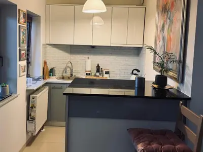 Kuchnia lub aneks kuchenny w obiekcie Przytulne studio na Sadybie