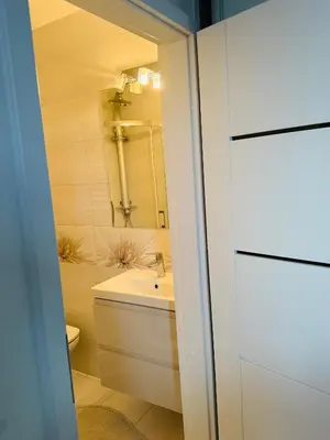 Łazienka w obiekcie Przytulne studio na Sadybie