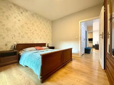Łóżko lub łóżka w pokoju w obiekcie Cozy Stay Apartment Szaserów