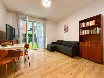 Telewizja i/lub zestaw kina domowego w obiekcie Cozy Stay Apartment Szaserów