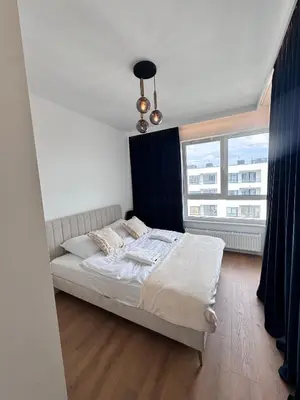 Łóżko lub łóżka w pokoju w obiekcie Forest Apart VI Urbino