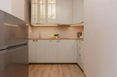 Kuchnia lub aneks kuchenny w obiekcie Cozy & Bright Studio Zupnicza by Noclegi Renters