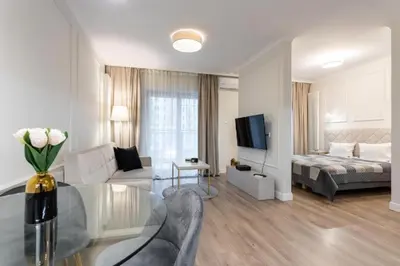 Łóżko lub łóżka w pokoju w obiekcie Urban Chic - Luxury Stay for up to 15 Guests in Mennica Residence, Warsaw Center