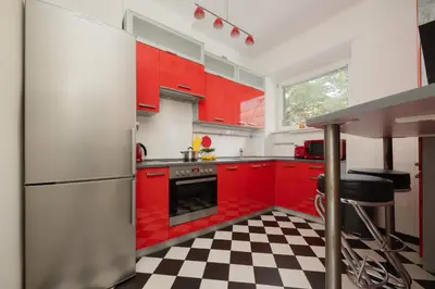 Kuchnia lub aneks kuchenny w obiekcie Cozy Family Apartment Belwederska Near Łazienki by Noclegi Renters