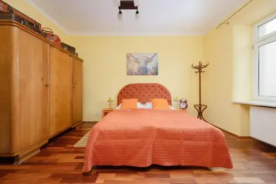 Łóżko lub łóżka w pokoju w obiekcie Cozy Family Apartment Belwederska Near Łazienki by Noclegi Renters