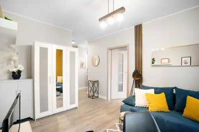 Część wypoczynkowa w obiekcie Cozy Warsaw Apart with Gym close to the Airport and City Centre