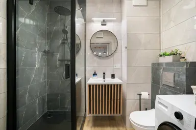 Łazienka w obiekcie Cozy Warsaw Apart with Gym close to the Airport and City Centre