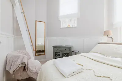 Łóżko lub łóżka w pokoju w obiekcie Śródmieście Piękna Comfort Apartments
