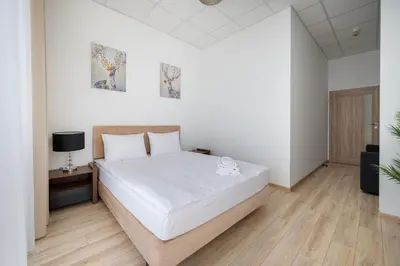 Łóżko lub łóżka w pokoju w obiekcie Varsovia Jerozolimskie Apartment 203 by BookingHost