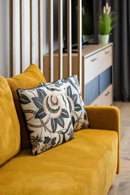 Część wypoczynkowa w obiekcie Komfortowe Rodzinne Studio Okrzei Warszawa by Noclegi Renters