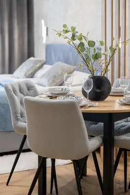 Część wypoczynkowa w obiekcie Komfortowe Rodzinne Studio Okrzei Warszawa by Noclegi Renters