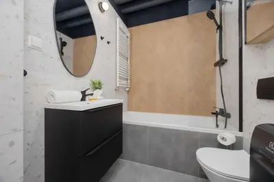Łazienka w obiekcie Komfortowe Rodzinne Studio Okrzei Warszawa by Noclegi Renters
