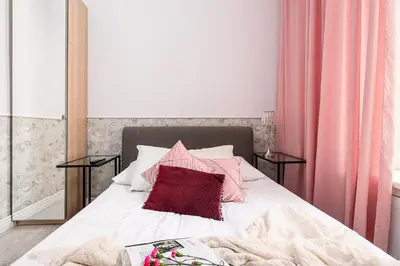 Łóżko lub łóżka w pokoju w obiekcie ShortStayPoland Vintage 21