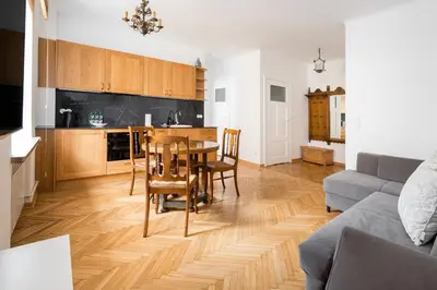 Kuchnia lub aneks kuchenny w obiekcie Jezuicka Charming Apartment by BookingHost