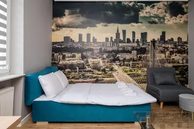 Część wypoczynkowa w obiekcie Warsaw Skyline Blue Studio by BookingHost