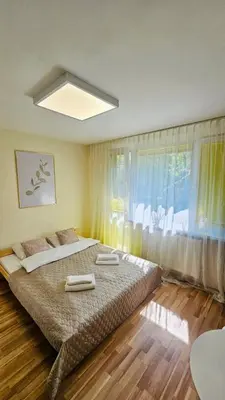 Łóżko lub łóżka w pokoju w obiekcie Batorego16 Yellow Studio