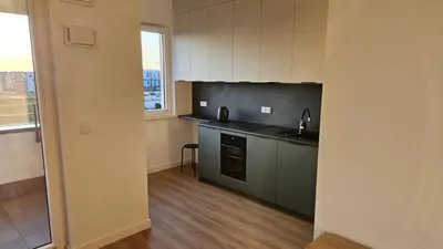 Kuchnia lub aneks kuchenny w obiekcie Bemowo Apartment