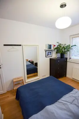 Łóżko lub łóżka w pokoju w obiekcie Blue Haven Warsaw