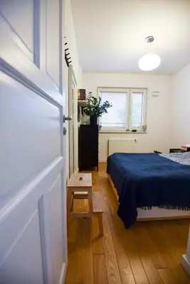 Łóżko lub łóżka w pokoju w obiekcie Blue Haven Warsaw