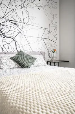 Łóżko lub łóżka w pokoju w obiekcie Apartament WawaBed