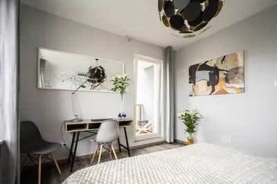 Łóżko lub łóżka w pokoju w obiekcie Apartament WawaBed