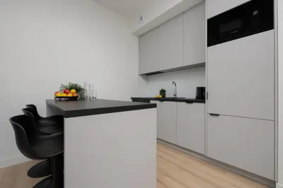 Kuchnia lub aneks kuchenny w obiekcie Prestigious Apartments with Sauna & Gym by Renters Prestige