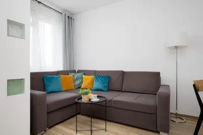 Część wypoczynkowa w obiekcie Modern Apartment Near Airport Warsaw Wlochy by Noclegi Renters