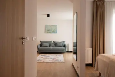 Łóżko lub łóżka w pokoju w obiekcie Modern Apartment near National Stadium