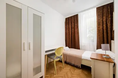 Łóżko lub łóżka w pokoju w obiekcie Dzielna Comfort Apartment by BookingHost