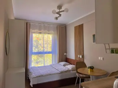 Łóżko lub łóżka w pokoju w obiekcie Apartament Motyl