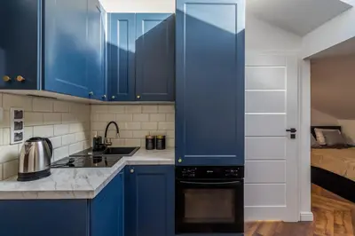 Kuchnia lub aneks kuchenny w obiekcie Close-Golden Apartments Waw - Old Town - Marcinkowskiego #2