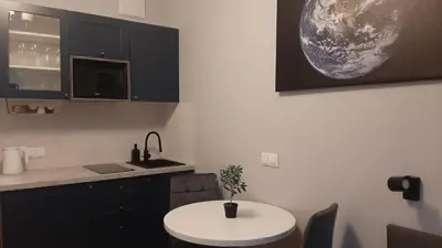 Kuchnia lub aneks kuchenny w obiekcie Apartament Planeta