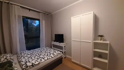 Łóżko lub łóżka w pokoju w obiekcie Apartament Planeta