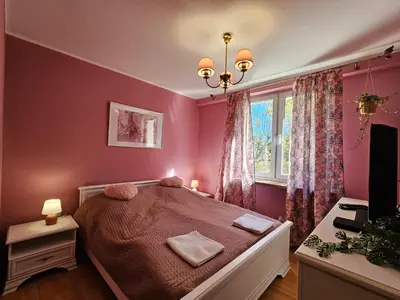 Łóżko lub łóżka w pokoju w obiekcie 3 pokoje koło Parku przy Żwirki