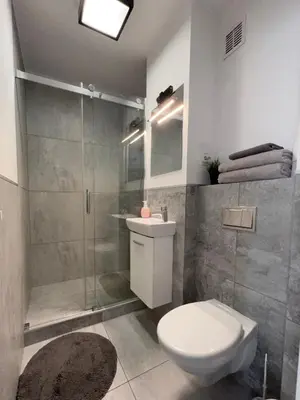 Łazienka w obiekcie Modern and comfortable flat near Palace of Culture