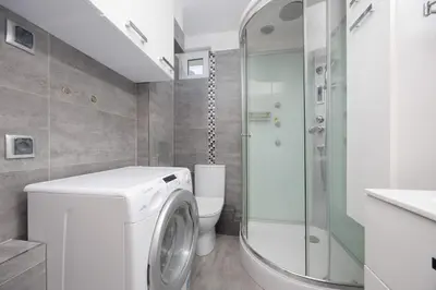 Łazienka w obiekcie Modern Apartment in Warsaw with City View and Fan by Noclegi Renters