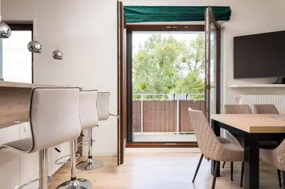 Telewizja i/lub zestaw kina domowego w obiekcie Krasińskiego Deluxe Apartment by BookingHost
