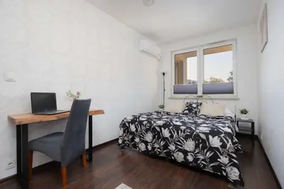 Łóżko lub łóżka w pokoju w obiekcie Stylowy Apartament w Warszawie Sypialnia & Parking w Garażu by Noclegi Renters