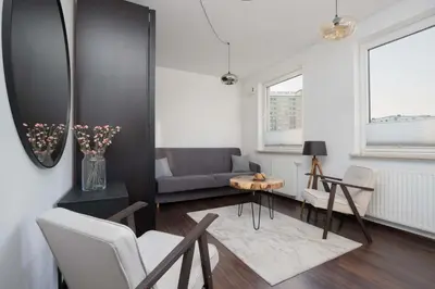 Część wypoczynkowa w obiekcie Stylowy Apartament w Warszawie Sypialnia & Parking w Garażu by Noclegi Renters