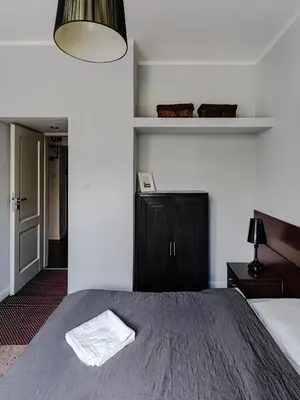 Łóżko lub łóżka w pokoju w obiekcie 1-bedroom Apartment City Center