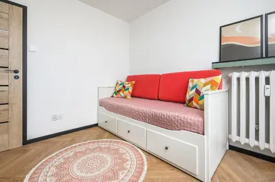 Łóżko lub łóżka w pokoju w obiekcie P&O Apartments Piwarskiego - Mokotów