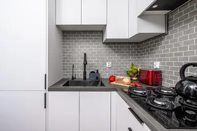 Kuchnia lub aneks kuchenny w obiekcie P&O Apartments Piwarskiego - Mokotów